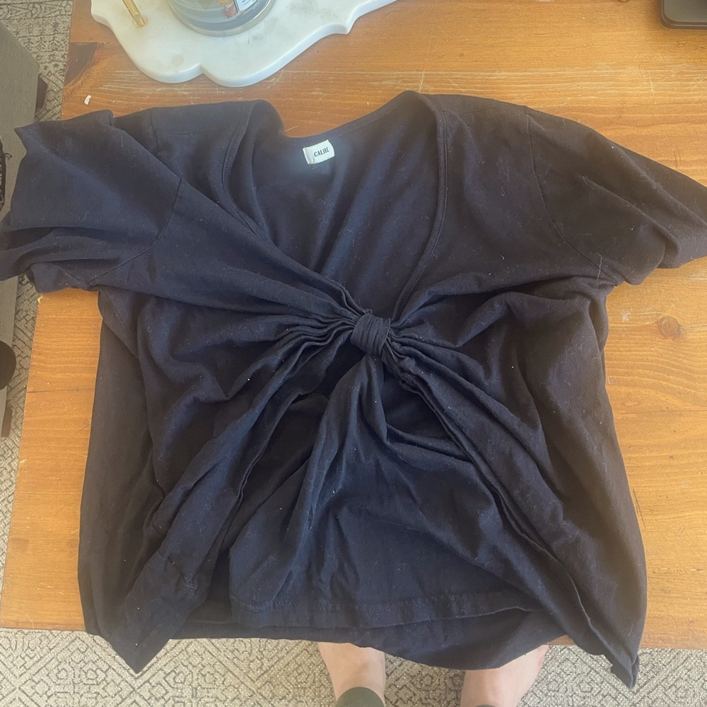 Black short sleeve v neck with cut out detail